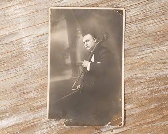 Vintage studio photo, musician portrait, sepia tone