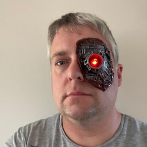 Cyberpunk eye piece. With blood.