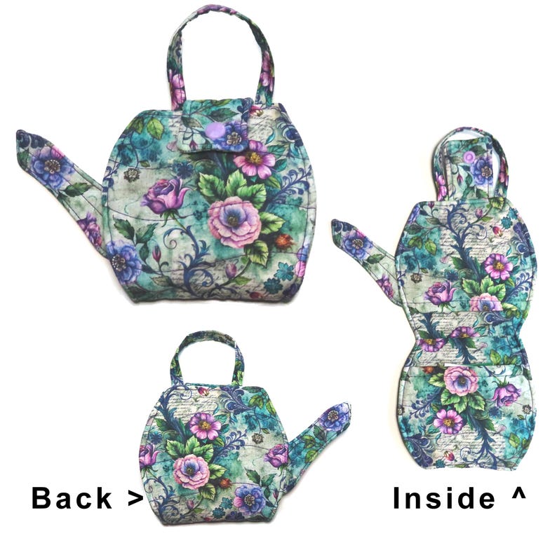 May include: A floral-patterned teapot-shaped bag with a handle, spout, and a small pocket. The bag features a teal background with pink, purple, and blue flowers. The text "Back >" and "Inside ^" are visible.