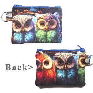May include: Two small, zippered coin purses with a blue trim and a key ring. The purses feature a colorful owl design. One purse shows two owls, and the other shows three owls. The word "Back>" is printed on the image.