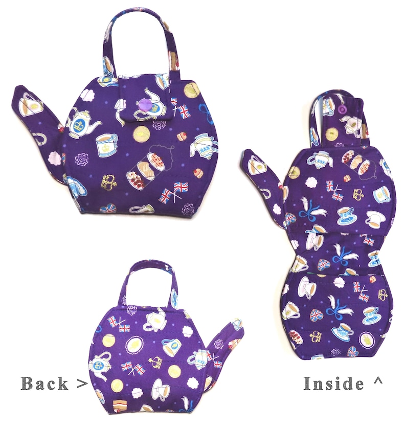 May include: A purple teapot-shaped tea cozy with a handle, spout, and a small pocket. The fabric is patterned with teacups, teapots, and British flags. The image shows the front, back, and inside of the cozy.