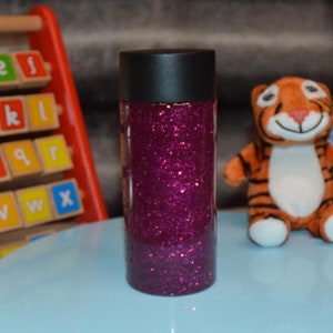 Pink Glittery Sensory Bottle for Kids Learning Development | Handmade Gift to Entertain and Calm Children&#39;s Sensory Needs.