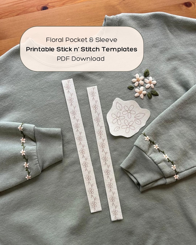 May include: Sage green sweatshirt with floral embroidery on the sleeve cuffs. Includes printable stick-and-stitch templates for floral pocket and sleeve designs. The text on the image reads: "Floral Pocket & Sleeve Printable Stick n' Stitch Templates PDF Download."