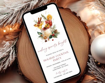 May include: A smartphone displaying a digital holiday cocktail party invitation. The design features watercolor illustrations of festive drinks with garnishes, and text that reads: making spirits bright, HOLIDAY COCKTAIL PARTY, FRIDAY, DECEMBER 17TH AT 6 PM, 123 MAIN STREET, LAKETOWN, NC 12345, kindly reply to CATHERINE 123 456 7890.