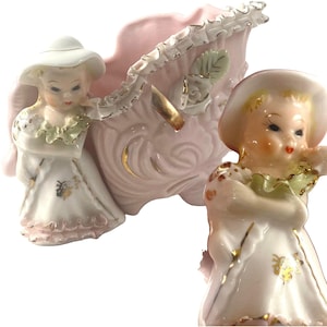 Charmante vintage damesplanter met roze en gouden accenten