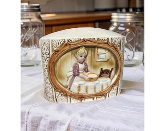 Vintage 1978 Sears Roebuck Ceramic Napkin Holder With Pioneer Women Girl Baking Scene