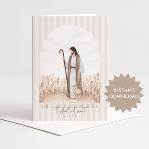 Puede incluir: Una tarjeta de felicitación con una ilustración en acuarela de un pastor sosteniendo un bastón con un cordero en un campo de trigo. El fondo tiene un patrón de rayas beige y un arco. El texto dice: THE LORD IS MY SHEPHERD I shall not want Psalm 23:1.