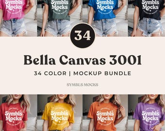 May include: A mockup bundle of Bella Canvas 3001 t-shirts in various colors. The image displays multiple t-shirts in different colors, including pink, green, blue, and black. The text "Symbls Mocks" is printed on each shirt. The image also includes the text "34 COLOR | MOCKUP BUNDLE".