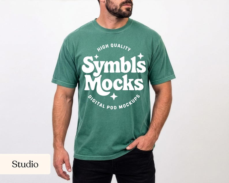 May include: A green t-shirt with the text "Symbls Mocks" in white, along with the words "High Quality" and "Digital Pod Mockups". The shirt is worn by a person in a studio setting.