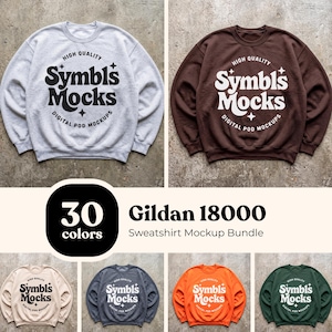 May include: A collection of Gildan 18000 crewneck sweatshirts in various colors including light gray, brown, beige, dark gray, orange, and dark green. Each sweatshirt features a circular graphic with the text Symbl's Mocks, High Quality, and Digital Pod Mockups.