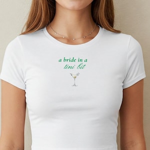 A Bride In A Tini Bit Baby Tee, Dirty Martini Themed Bachelorette Party, Dirty Martini Bride Baby Tee, Future Bride, Bride-To-Be