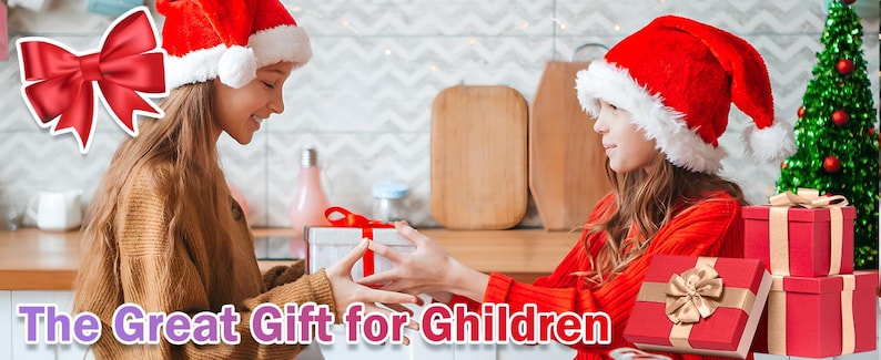 May include: Two children wearing Santa hats exchange a gift wrapped in red and white paper with a gold bow. The gift is on a table with other wrapped gifts in the background. The text "The Great Gift for Children" is at the bottom of the image.