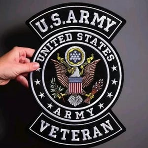 May include: Black and white embroidered patch with the words "U.S. ARMY UNITED STATES ARMY VETERAN". The patch features a stylized eagle with a shield and stars.