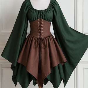 May include: A dark green dress featuring long, wide bell sleeves and a square neckline. The bodice includes a brown corset-style overlay with gold-toned metal eyelets and a front lace-up closure. The skirt has an asymmetrical, pointed hemline.