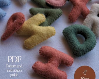 May include: A set of felt alphabet letters in various colors, including red, yellow, green, and blue. The letters are 4 inches tall and are perfect for a child's playroom or nursery. PDF Pattern and instruction guide included.