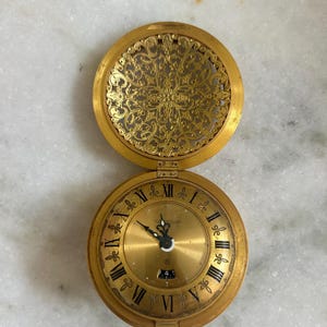 Jaeger-LeCoultre Vintage Travel Alarm Clock – Ref. 105 Folding Desk Clock – 8-Day Swiss Movement – 1970s Collectible Gilt Timepiece