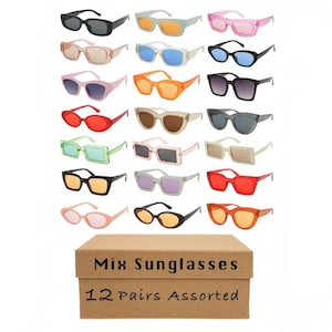 May include: A collection of twenty-one pairs of sunglasses in various frame shapes and lens colors, including black, pink, orange, blue, and green, arranged above a brown cardboard box labeled Mix Sunglasses 12 Pairs Assorted in black text.
