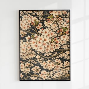 以下が含まれることがあります： 桜の枝の精巧なイラストが描かれた額入りのプリント。白い花とピンクの花の房が暗い背景に描かれ、茎と緑の葉が見えます。プリントは黒いフレームに入っています。
