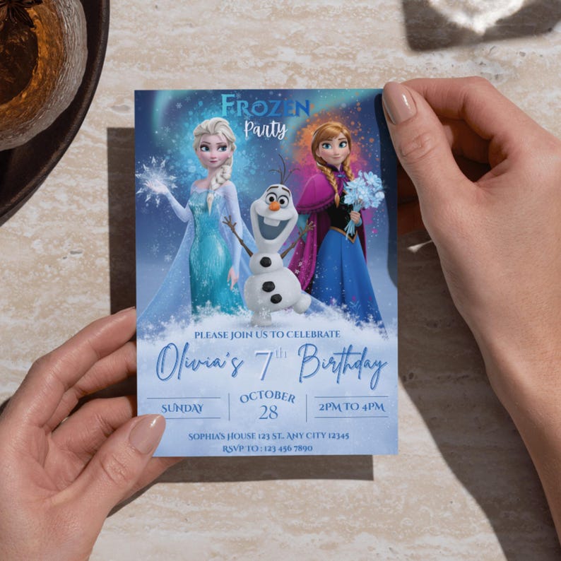 May include: A light blue invitation card for a Frozen-themed birthday party. The card features Elsa, Anna, and Olaf. Text includes "Frozen Party", "Olivia's 7th Birthday", date, time, and RSVP information.