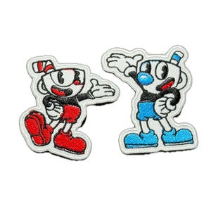 May include: Two embroidered patches featuring cartoon characters. One character is red, black, and white, with a red shoe and a red and white striped hat. The other character is blue, black, and white, with blue shorts and shoes.