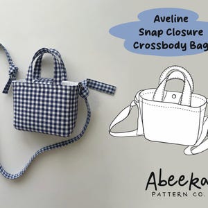 May include: A navy and white gingham crossbody bag with two top handles, a snap closure, and a long adjustable strap. The image includes the text Aveline Snap Closure Crossbody Bag and Abeeka Pattern Co. next to a line drawing of the bag.