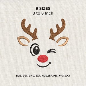 May include: An embroidery design of a winking reindeer face with brown antlers, a red nose, and black outlines. The text reads 9 SIZES 3 to 8 Inch and lists file formats EMB, DST, CND, EXP, HUS, JEF, PES, VP3, XXX on a light fabric background.