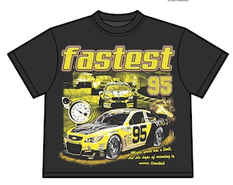 May include: Black t-shirt with a racing-themed graphic. The design features the word "Fastest" in yellow, the number "95", and a yellow race car. The text "Maybe speed has a limit, but the hope of winning is never limited" is also included.