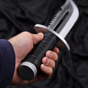 Outdoor photo of crafted knife replica for Etsy gift listings
