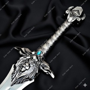 May include: A detailed, silver-colored sword with an ornate handle and a lion's head design on the hilt. The blade is polished, and a blue gemstone accents the crossguard. The sword is set against a dark, textured background.
