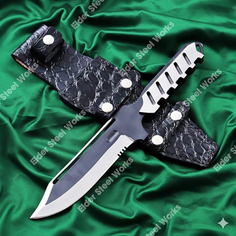 May include: A tactical knife with a silver blade and a black handle, resting in a black leather sheath. The sheath has a crocodile skin texture and is secured with silver snaps. The knife is designed for outdoor use.