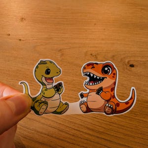 Adesivos de dinossauros para jogar cartas