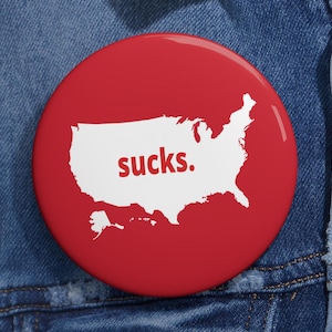 America Sucks Pins Buttons Funny Anti USA Anti Trump Americans Wear Abroad Map America Sucks Humorous Pins Resistance