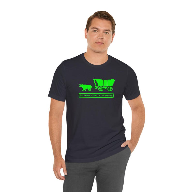 You Have Died of Oligarchy Oregon Trail TShirts Parody TShirts Funny Vintage Game Humorous Anti Trump Elon Musk Dark Grey Tees Green Bull and Wagon Resist