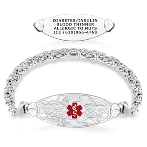 May include: A silver medical alert bracelet with a detailed chain design. The central plate features a red medical symbol and wing design. The text on the plate reads: DIABETES/INSULIN, BLOOD THINNER, ALLERGIC TO NUTS, ICE:(619)866-4768.