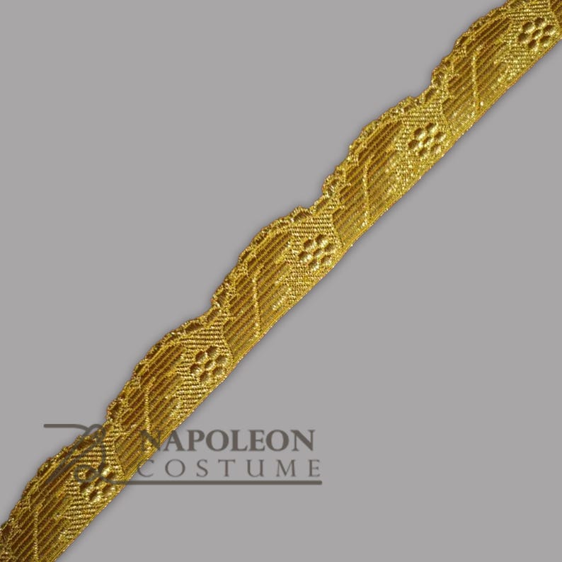 May include: Gold trim with a floral pattern. The trim is about 1 inch wide and has a scalloped edge.