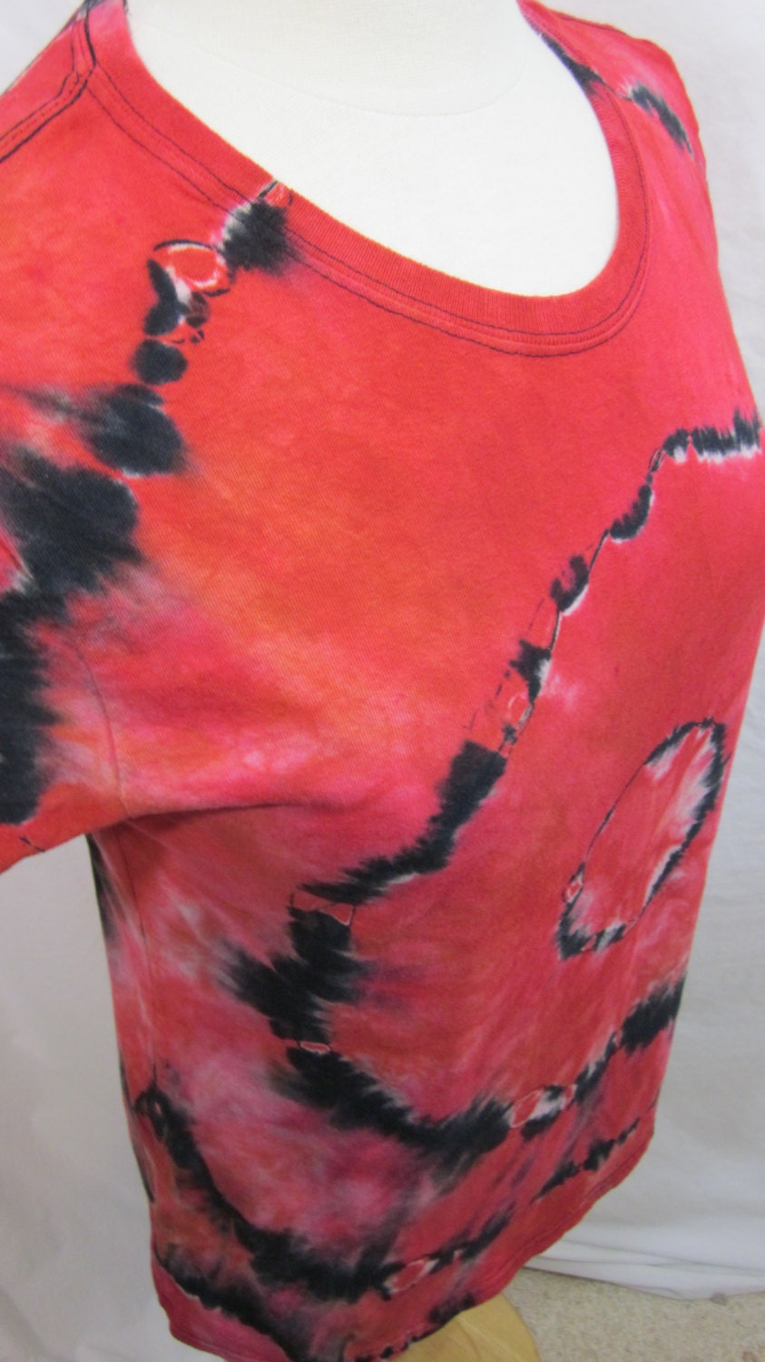 reverse tie dye orange shirt