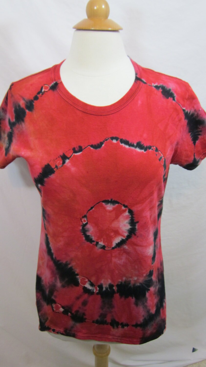reverse tie dye orange shirt