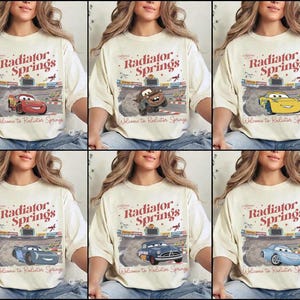 May include: Cream-colored t-shirts featuring various cartoon car designs with the text "Radiator Springs" and "Welcome to Radiator Springs" in a vintage style. The shirts showcase different car characters.