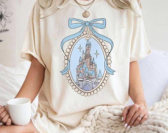 Vintage Comfort Colors Disney Castle Shirt, Magic Kingdom Blue Coquette Shirt, Disney Girls Trip T-Shirts, Disneyworld Family Trip Shirt.