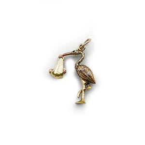 Breloque cigogne articulée vintage - Or jaune 9 carats