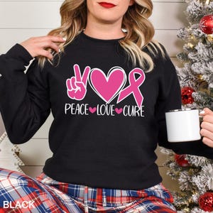 Peace Love Cure Sweatshirt, Breast Cancer Awareness Sweatshirt, Cancer Ribbon Hoodie,Pink Ribbon Hoodie, Breast Cancer Month Crewneck,333510