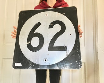 Old Metal highway 62 Sign