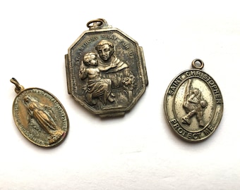 Three 1930s Religious Charms or Pendants