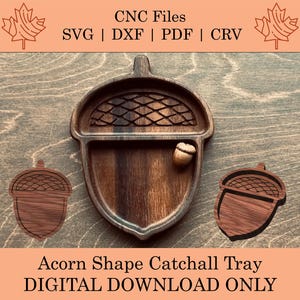 May include: A wooden acorn-shaped tray with a decorative design. The tray is perfect for holding small items like jewelry or keys. The image also includes the text "CNC Files SVG | DXF | PDF | CRV Acorn Shape Catchall Tray DIGITAL DOWNLOAD ONLY".