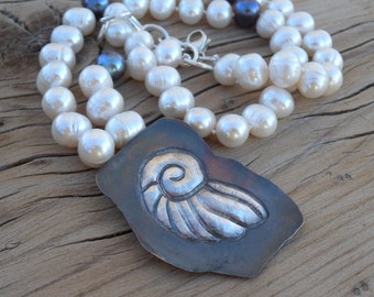 Repousse Shell Pendant on Pearl Necklace