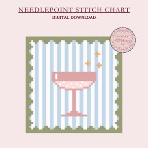 May include: A needlepoint stitch chart featuring a pink champagne glass with white polka dots and gold stars on a blue and white striped background. The chart is surrounded by a green border.