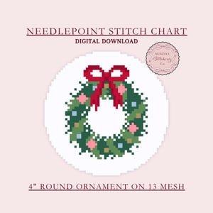 May include: Digital needlepoint stitch chart for a 10 cm round ornament on 13 mesh. The design features a pixelated wreath with a red bow, green leaves, and pink and blue accents. The text reads "NEEDLEPOINT STITCH CHART DIGITAL DOWNLOAD".