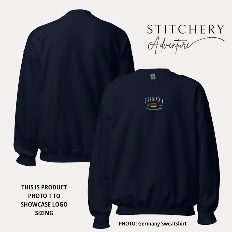 May include: Navy blue sweatshirt with the word "GERMANY" in white above a small German flag graphic. The sweatshirt has the text "EST. 1996" and "THE UNITED STATES OF AMERICA" below the flag. The image also includes the text "STITCHERY Adventure".
