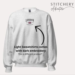 May include: A light gray sweatshirt with a black embroidered design that says "LONDON EST. 1948 UNITED KINGDOM" with a small Union Jack flag. The text "Light Sweatshirts comes with dark embroidery This is different product*" is printed below the design.
