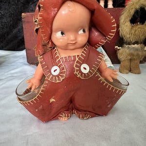 Vintage 1950s Doll Toothpick or Salt and Pepper Holder – Red Oilcloth Outfit – Midcentury Kitsch with Glass Inserts